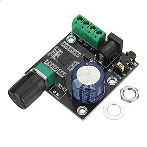 PAM8610 With Volume 12V Dual-channel Digital Amplifier Board Stereo Audio Amplifier Board 15W * 2 - black PCB, a volume knob, a green terminal block, a DC power jack, an audio input port, and mounting hardware.