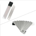 Paper Cutter Knife Blade in Plastic Tube Packing 10 PCS - a set of silver segmented utility blades, some inside a plastic storage tube and some fanned.