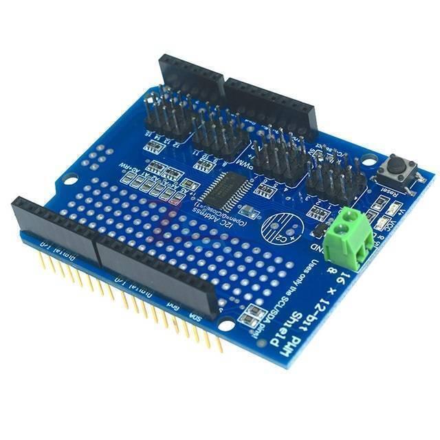 PCA9685 12 Bit 16 Channel Servo Shield - a blue rectangular circuit board featuring a green terminal block, a reset button, and multiple pin headers.