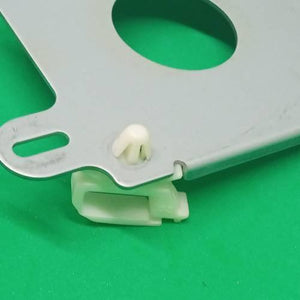 PCB Inserting Hole Cable Clamp, Body PCB Inserting Cable Clamps - a close-up showing a white plastic cable clamp attached to a grey metal plate via a snap-fit connector.