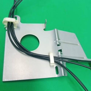 PCB Inserting Hole Cable Clamp, Body PCB Inserting Cable Clamps - two white plastic cable clips mounted on a silver metal plate with black wires threaded through them.