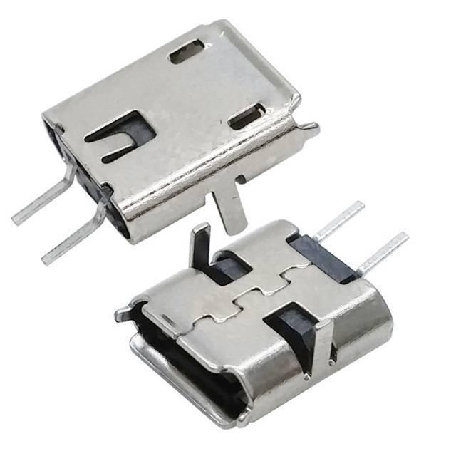 PCB Mount Micro USB Connector - two silver-coloured metal micro USB female ports with through-hole mounting pins angled for circuit board assembly.