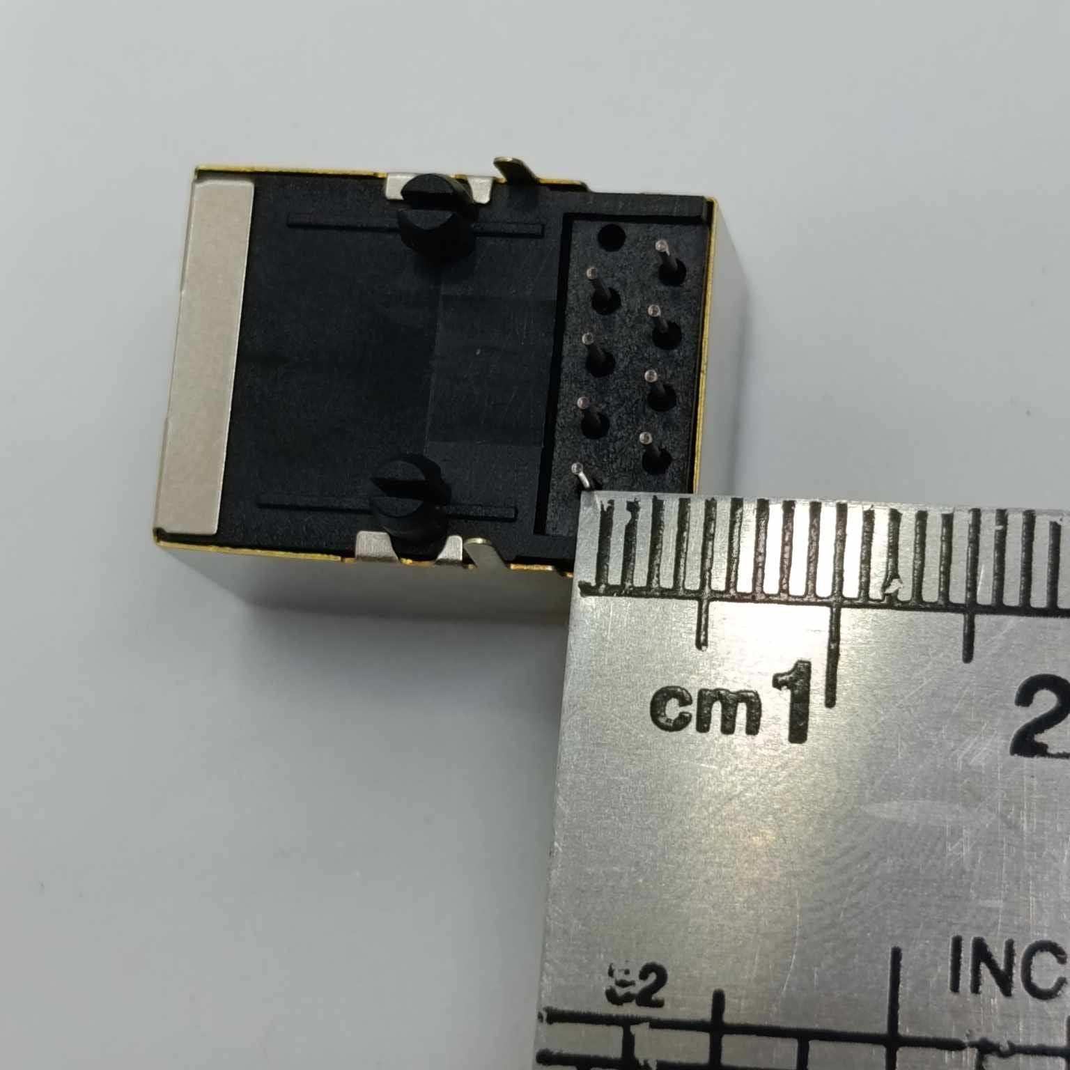 PCB Mount RJ45 Ethernet Connector - shown in a top-down close-up view with a metal ruler measuring its width in centimeters.
