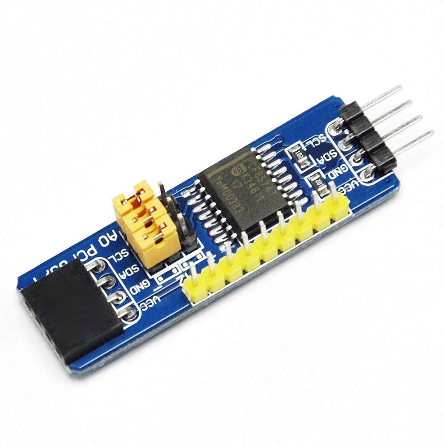 PCF8574 IO Expansion Board I2C-Bus Evaluation Development Module – Expand Your Microcontroller's I/O Capabilities - a blue rectangular circuit board with a black integrated chip, yellow jumper caps, and silver pin headers.