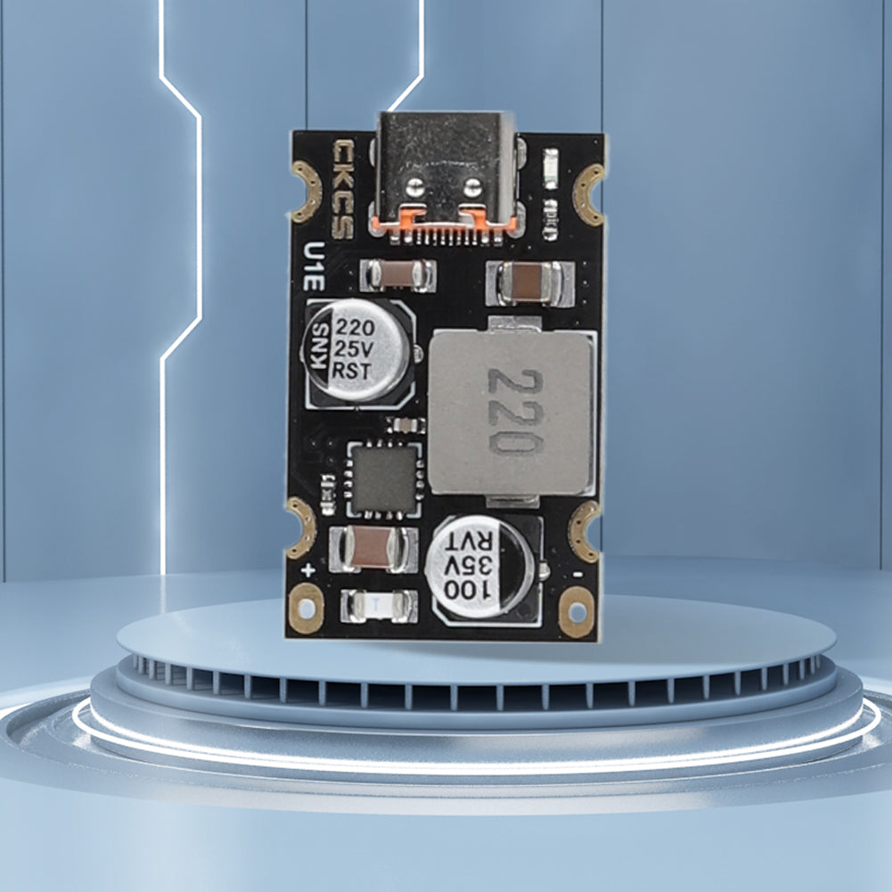 PD 65W Fast Charging Module Type C Interface Fast Charging Adapter Board DC8 to 32V Charging Protection - a black rectangular circuit board featuring a USB Type-C port, two cylindrical capacitors, and a square inductor component.