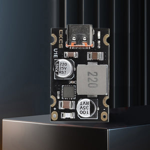 PD 65W Fast Charging Module Type C Interface Fast Charging Adapter Board DC8 to 32V Charging Protection - a black rectangular circuit board featuring a USB Type-C port, two cylindrical capacitors, and a large square inductor.