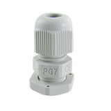 PG7 Cable Gland - shown as a grey plastic connector with a threaded body, a tightening nut, and a hexagonal base with mounting holes.