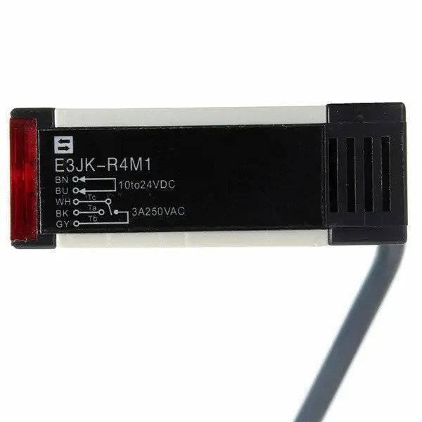Photo Sensor For Disinfection Gate Lot - a rectangular black and white sensor with a red lens and a wiring diagram printed on its side.