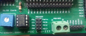 Pic Lab-iii Microchip Pic Microcontroller Development Board - a green PCB with a MAX485 chip, a blue potentiometer, an RS485 terminal block, and pin headers.