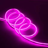 Pink Neon Light 12V 1 Meter - shown as a flexible, glowing pink LED strip coiled into several circular loops against a dark background.