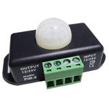 PIR8 Controller 12V 24V PIR Sensor LED Dimmer Switch Motion Timer Function Sign Control LED Strip Tape Lights - a black rectangular motion sensor with a white dome lens and a green four-terminal screw connector block.