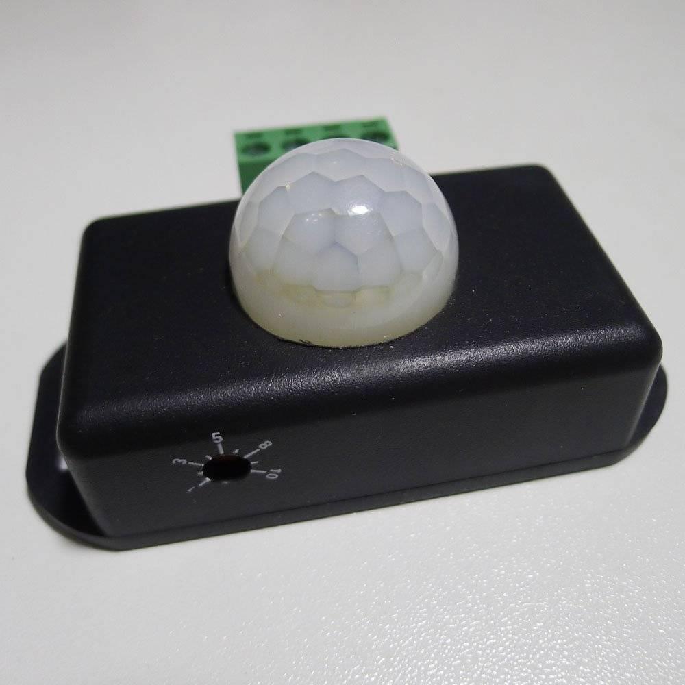 PIR8 Controller 12V 24V PIR Sensor LED Dimmer Switch Motion Timer Function Sign Control LED Strip Tape Lights - a black rectangular motion sensor module featuring a white hemispherical lens and a circular adjustment dial.