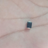 PJ431K SMD Schottky Diode – Precision Adjustable Voltage Reference - a close-up shot of the small black rectangular electronic component held in a palm, showing the text "PJ431K KC" printed on it.