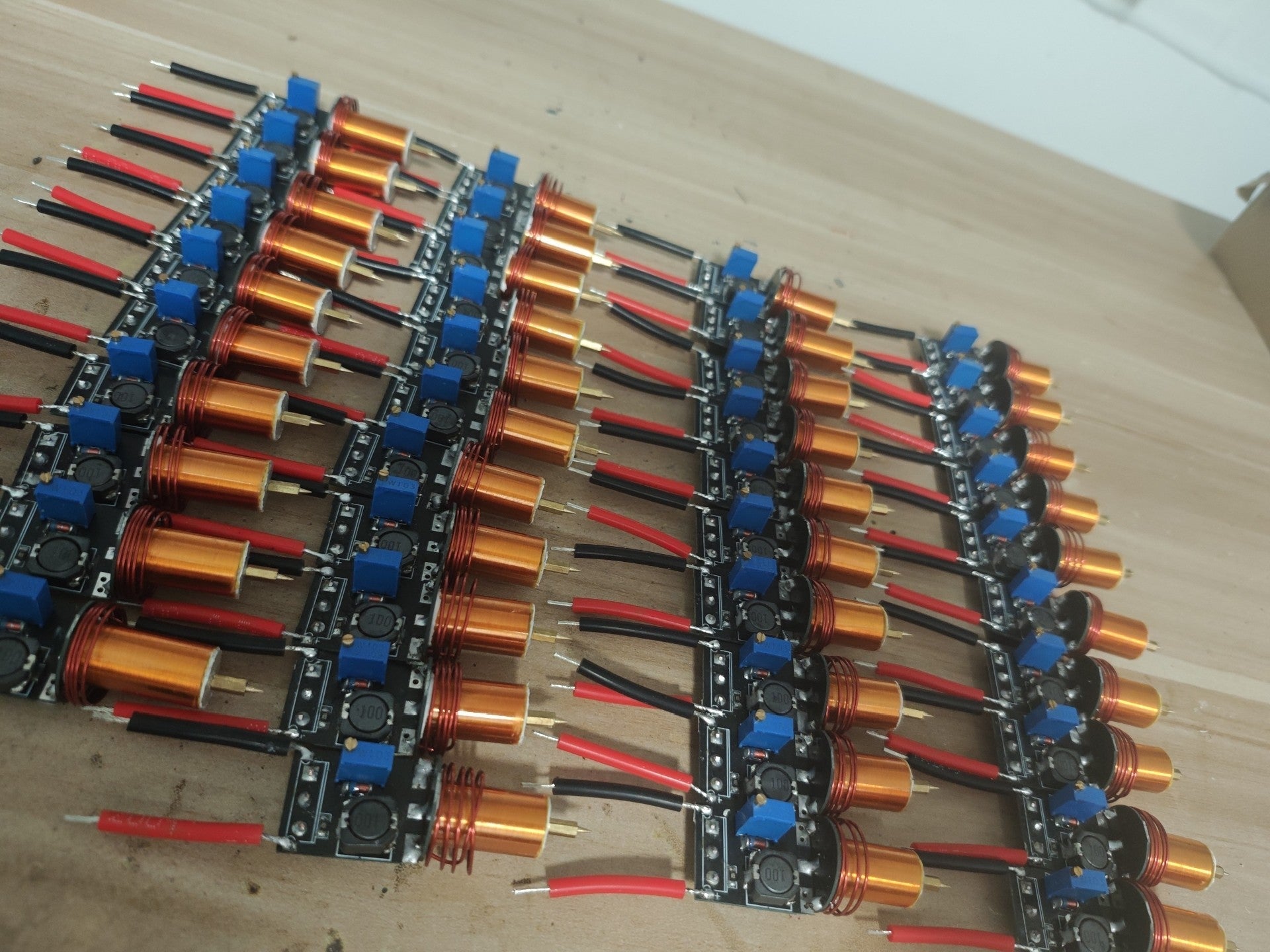 Plasma Arc Fire Head High-Frequency Electric Flame 15–24V Plasma Ignition Module-digilog.pk - shown as a collection of black circuit boards with copper coils.