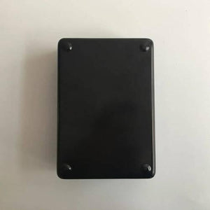 Pocket Size Analog Multimeter MF15 Digital Avometer Universal Meter - the plain, black, rectangular back panel of the device with four small rounded feet at the corners.