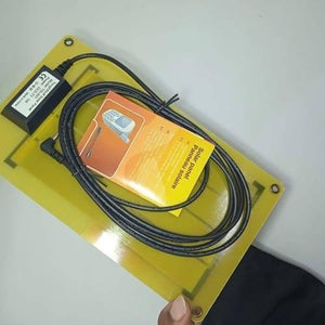 Portable 1W Mini Tough Stuff Solar Panel TSI 501 - shown with its attached black cable, a 3.5mm jack connector, and an orange instruction manual.