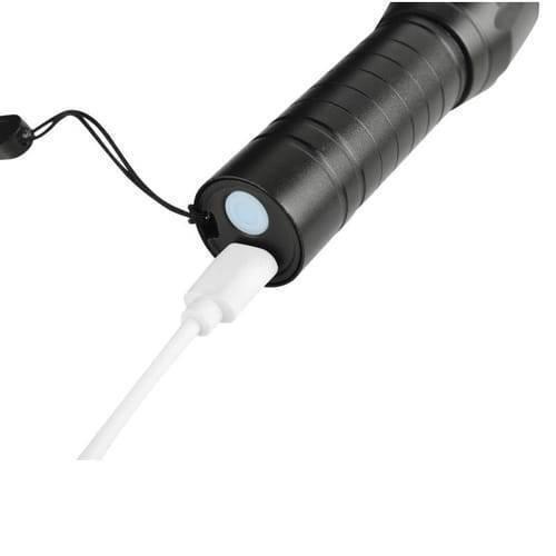 Portable Mini 2 In 1 LED Flasht Light 1000 Lumens 3modes USB Rechargeable LED Torch Light - a close-up showing the black metal body being charged via a white USB cable connected to its base port.