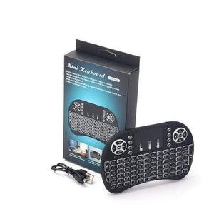 Portable Mini Wireless Keyboard Controller With Touchpad Mouse Combo And Backlight - with black packaging box, a USB charging cable, and the black handheld keyboard featuring a touchpad and buttons.