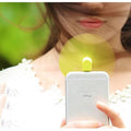 Portable USB Mini Fan For Iphone 5/5s/6/6s/6s Plus - shown as a small lime green fan attached to the charging port of a silver iPhone.
