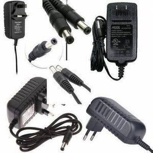 Power Supply Adapter 15V 1A DC Jack 5.5mm x 2.1mm Used - a collage of black power adapters with various plug types and DC output connectors.