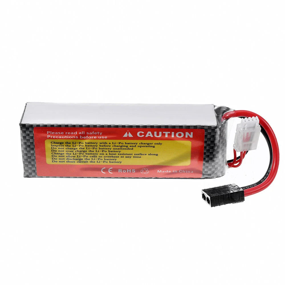Pre-Order LiPo battery 5200mAh 11.1V 50C 3S Li-Po 3 cell DJI quadcopter Li-Po - a rectangular black and grey checkered battery pack with a red caution label, a white balance connector, and a black plug.
