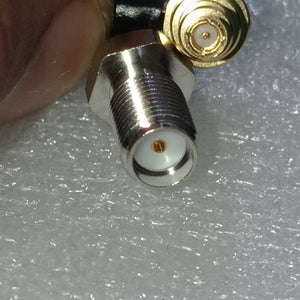 Pre Order RF RF Test Line MXHS83QE3000 Murata High Frequency C2 Test Line - a close-up showing two silver and gold-colored RF connectors with white dielectric centers.