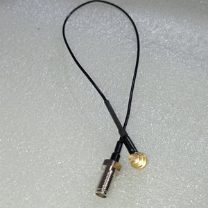 Pre Order RF RF Test Line MXHS83QE3000 Murata High Frequency C2 Test Line - a black coaxial cable with a threaded metal connector on one end and a gold circular connector.