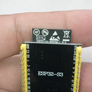 Pre Soldered ESP32-S3-DevKitC-1-N8R2 WROOM 1 Development Board 2.4G WiFi BT Module BLE5.0 - a close-up showing the black module with yellow header pins held between fingers.