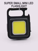COB Rechargeable Keychain Flashlight | Mini Small Flashlight With 3 Light Modes, Folding Bracket, Bottle Opener, And Magnet Base For Fishing, Walking, - product video, preview showing a black square keychain light with a large yellow COB panel and bottle opener
