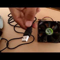 Turn CPU Fan Into Desk Fan OR USB Fan | DIY Science Project - product video, preview showing a black computer fan and a usb plug held by a hand