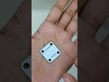 AS5600 Magnetic Encoder Magnetic Induction Angle Measurement Sensor Module 12bit High Precision For Arduino - product video, preview showing white square circuit board with four corner holes and small pin-out pads