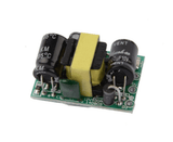Professional PCB Mount 5V 700mA 3.5W AC-DC Step Down Isolated Switching Power Supply Module - a small green circuit board with capacitors and transformer.