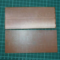Project Board | Veroboard | Prototyping Board | Stripboard - two brown rectangular circuit boards with rows of holes on a green cutting mat.
