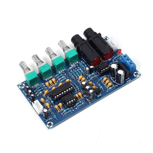 PT2399 Digital Microphone Amplifier Board - a blue circuit board with four potentiometers, two audio jacks, and various electronic components.