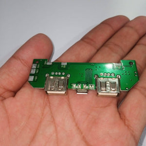 Pull Out 5V 2A DIY Power Bank Module With Emergency Light Points - shown as a green circuit board with two USB ports, a micro-USB port, and LED pads.