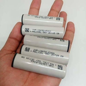 Pull-out High Quality 18650 3.7V 2600mAh Molicel Cell Battery - a hand holding five grey cylindrical batteries with printed model text and QR codes.