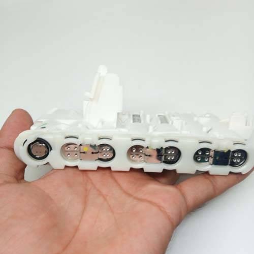 Pull-out High Quality 18650 3.7V 2600mAh Molicel Cell Battery - shown as a white plastic battery holder containing multiple cylindrical cells held in a hand.