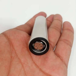 Pull-out High Quality 18650 3.7V 2600mAh Molicel Cell Battery - a close-up shot of a white cylindrical battery held in a hand, showing the top terminal.