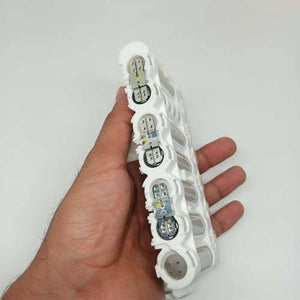 Pull-out High Quality 18650 3.7V 2600mAh Molicel Cell Battery - shown as a close-up of a white plastic battery holder containing several cylindrical cells.