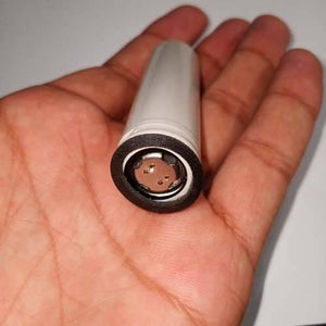 Pull-out High Quality 18650 3.7V 2600mAh Molicel Cell Battery - a close-up showing the white cylindrical body and the recessed metal contact end.