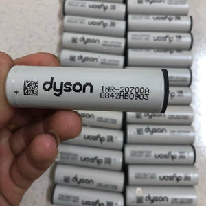 Pull-out Original Lithium Ion Cell 3.7V 3000mAh Li Ion Battery Cell INR-20700A - a close-up of a white cylindrical battery labeled Dyson INR-20700A.