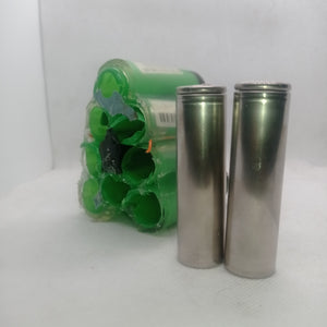 Pull-out Sony Murata Original Japanese 18650 Lithium Ion Cell 3.7V 2600mA Li Ion Battery Cell - two silver cylindrical battery cells standing next to a green plastic multi-cell battery pack.