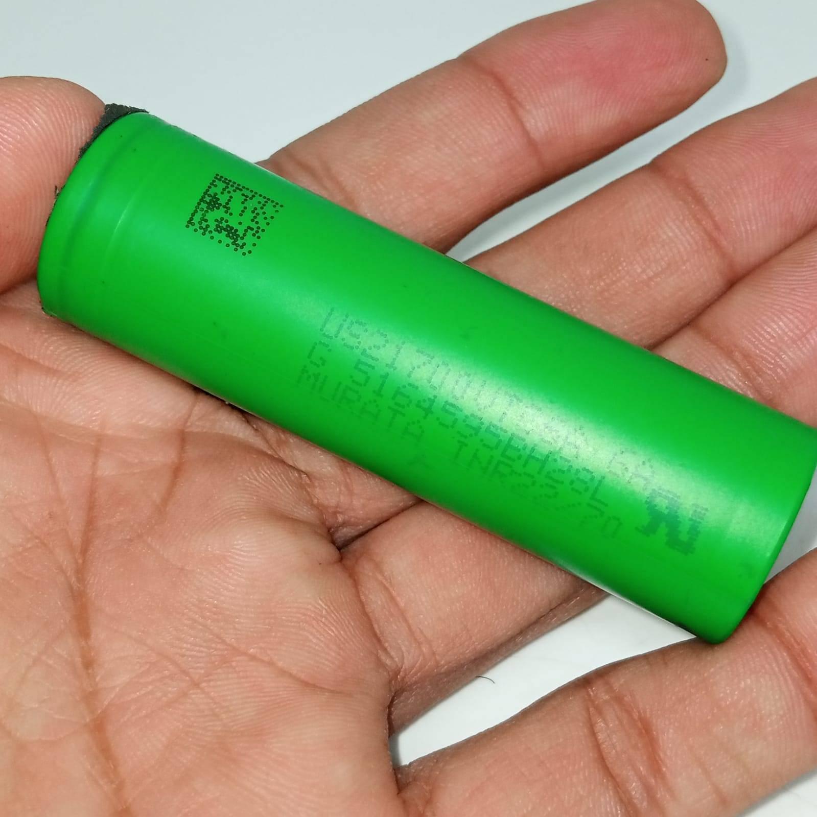 Pull-out US21700VTC6A Vtc6a Sony Murata Original Japanese 21700 Lithium Ion Cell 3.7V 4100mA Li Ion Battery Cell - the green cylindrical body with printed technical text and a QR code.