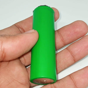 Pull-out US21700VTC6A Vtc6a Sony Murata Original Japanese 21700 Lithium Ion Cell 3.7V 4100mA Li Ion Battery Cell - a single green cylindrical battery held in a person's hand, showing the flat top and bottom terminals.