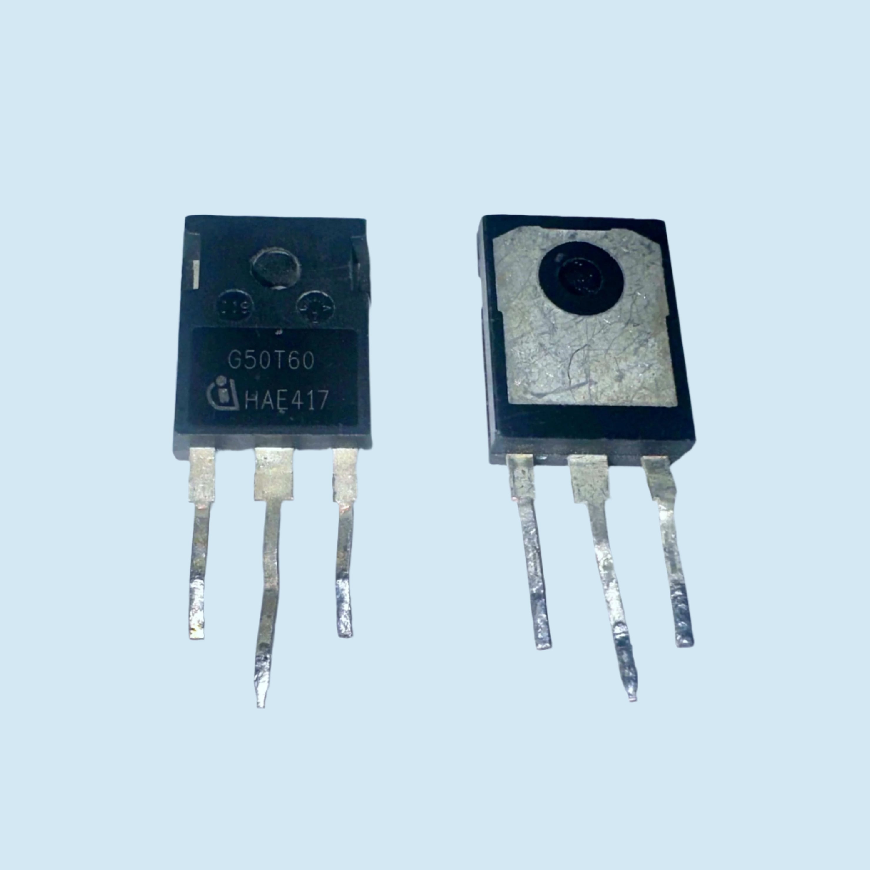 Pullout 600V 50A G50T60 IGBT Infineon TO-247|Digilog.pk - two black three-pin electronic components with metal heat sinks, one displaying text markings.