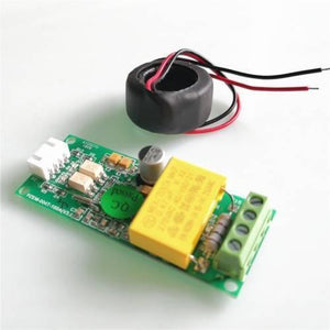 PZEM-004T 100A Single Phase Power Energy Meter Module - shown with its green circuit board, yellow capacitor, terminal block, and black current transformer.