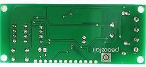 PZEM-004T 100A Single Phase Power Energy Meter Module - shown from the bottom side, featuring a green circuit board with solder points and a push button.