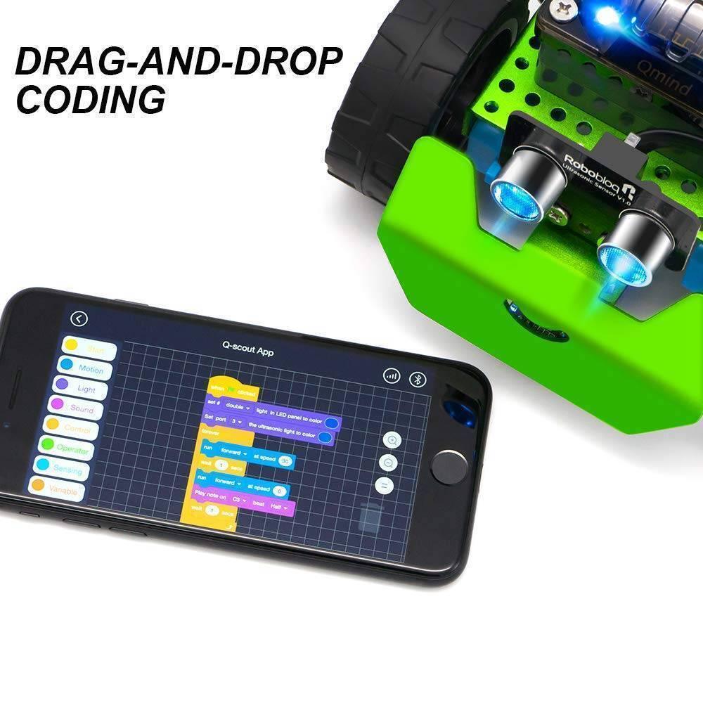Q-scout STEM Robot For Kids By Robobloq - shown with a green chassis, ultrasonic sensor, and a smartphone displaying a drag-and-drop coding interface.