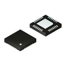 QFN DSPIC30F2010 - two black square integrated circuit chips, one viewed from the top and one from the bottom with exposed metal leads and pads.
