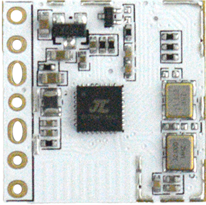RA24D18 24GHz Presence Sensor Module – Bluetooth Version 5.0, Human Detection & Occupancy Monitoring - a close-up of a white rectangular circuit board with a central black chip, two gold oscillators, and side pins.